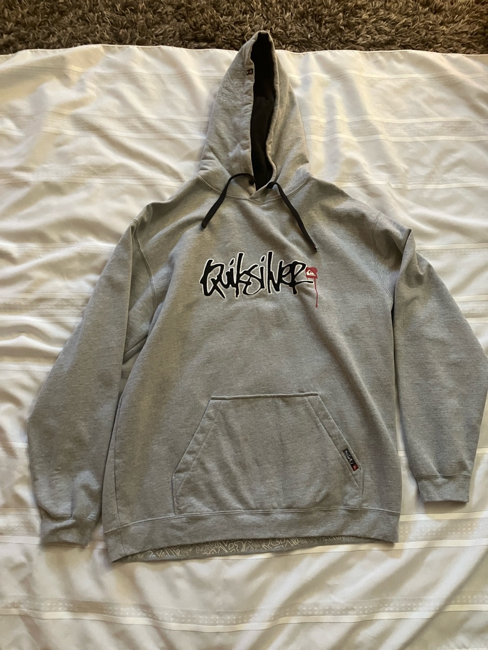 Quiksilver Light Gray Hoodie with Black Script and Red Detail